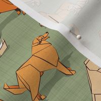 Small scale // Origami Golden Retriever and Labrador friends // sage green linen texture background orange and beige paper and cardboard dogs