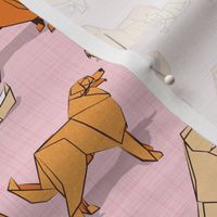 Small scale // Origami Golden Retriever and Labrador friends // pastel pink linen texture background orange and beige paper and cardboard dogs