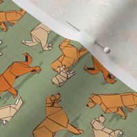 Tiny scale // Origami Golden Retriever and Labrador friends // sage green linen texture background orange and beige paper and cardboard dogs