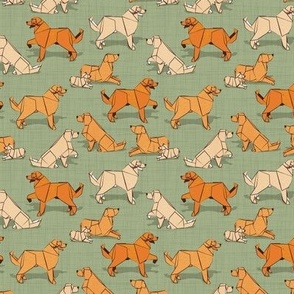 Tiny scale // Origami Golden Retriever and Labrador friends // sage green linen texture background orange and beige paper and cardboard dogs