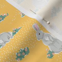 Spring rabbits on yellow 