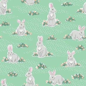 Spring rabbits on green