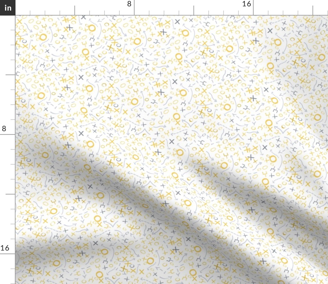 x and o scatter yellows and grays on white