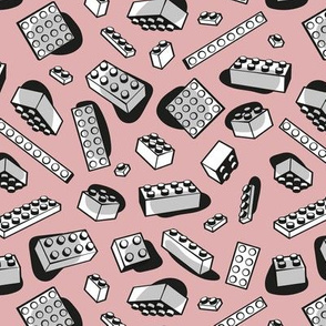 Small scale // Play with me // blush pink background black and grey kids plastic building bricks blocks toys