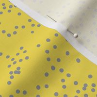 Grey dots on yellow. Confetti