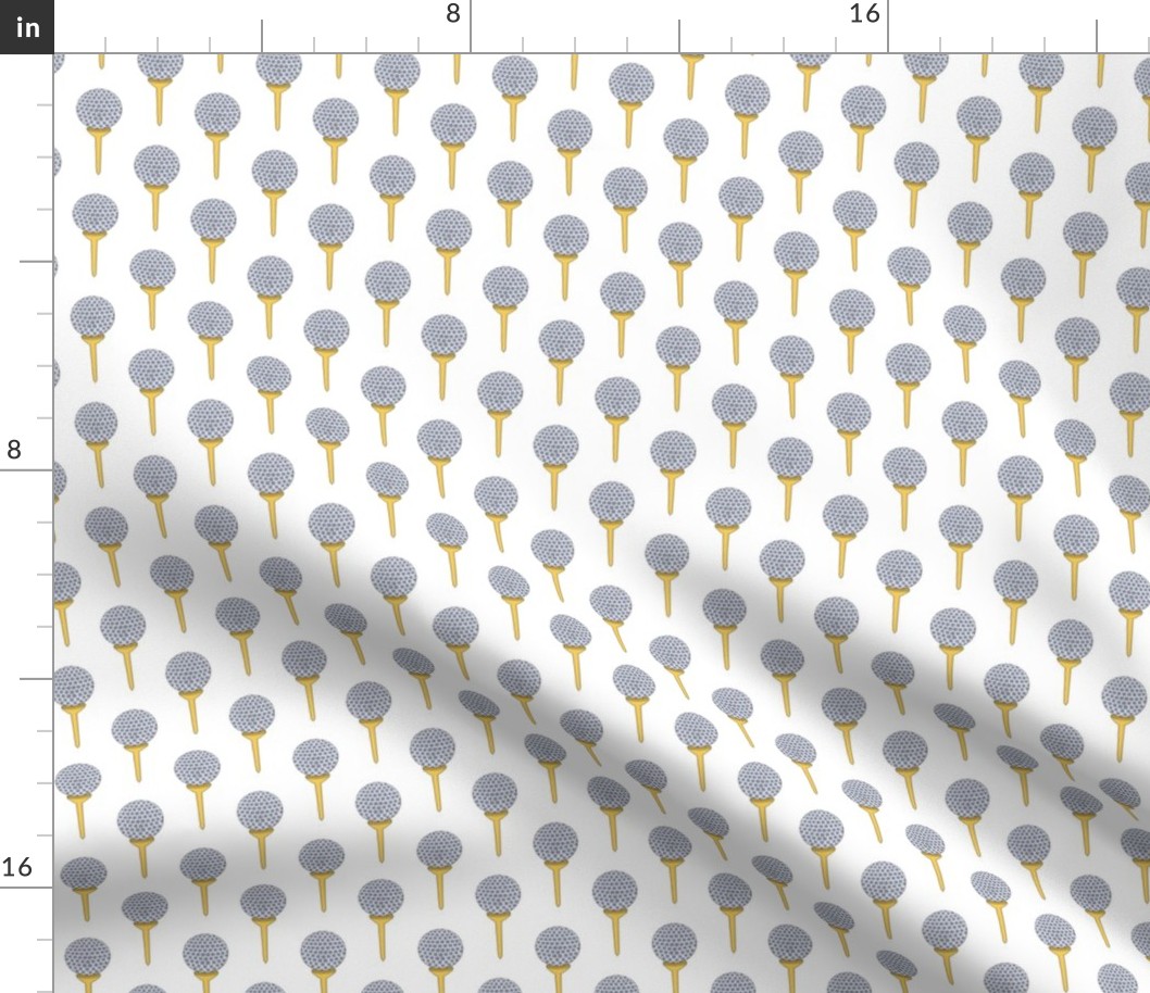 golf ball on tee gray yellow and white