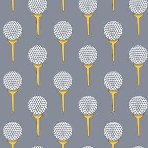 golf ball on tee gray and yellow