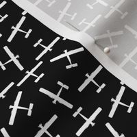 Scattered Vintage Airplane Silhouettes in White with a Black Background (Mini Scale)