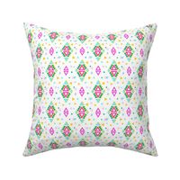 Tribal geometric pattern with green and pink diamond shapes