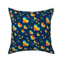 Rainbow love planets hearts confetti pride gay universe on navy blue rotated diagonal