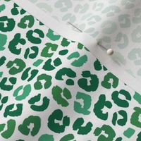 Little St Patrick's Day leopard design messy animal print boho nursery trend green on white 
