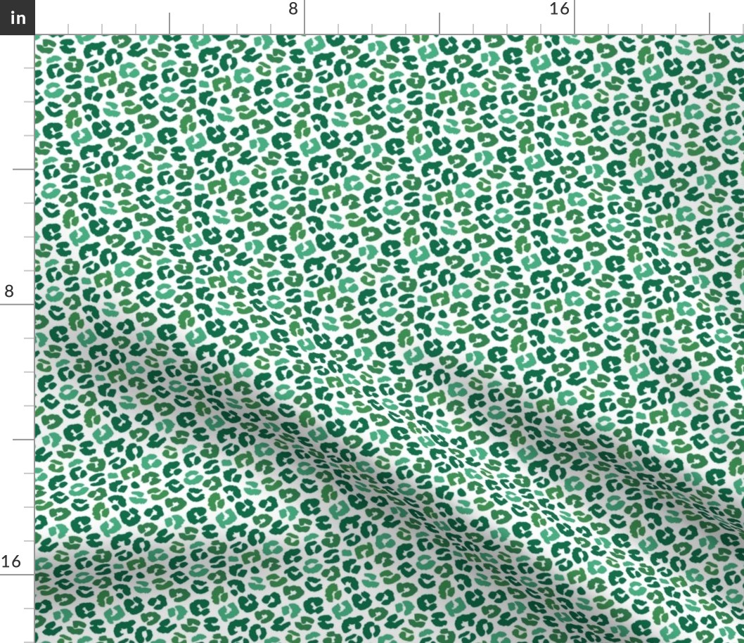 Little St Patrick's Day leopard design messy animal print boho nursery trend green on white 