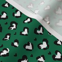 Little St Patrick's Day hearts leopard design messy animal print boho nursery trend white black on green SMALL