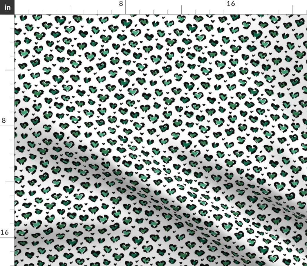 Little St Patrick's Day hearts leopard design messy animal print boho nursery trend green on white 