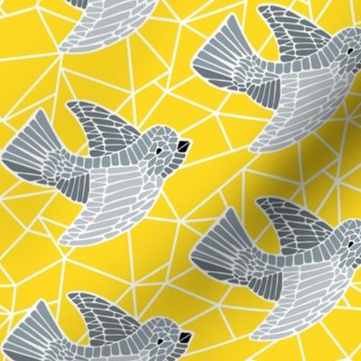 gray mosaic birds on yellow background