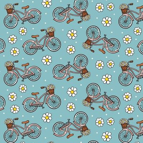 beach cruisers with flowers - tossed on blue - LAD21