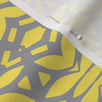 Grey and yellow abstract geometric ornaments