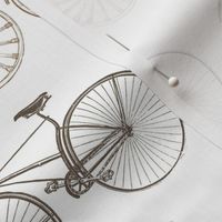 Large Vintage Bicycles in grays and browns on white background