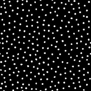 white dots on black background