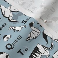 Small scale // Origami ABC animals // pastel blue background black and white paper geometric animals