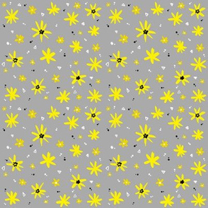 Simple yellow flowers on gray