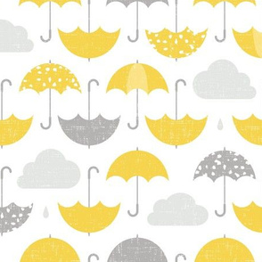 Yellow umbrellas in a rainy day 