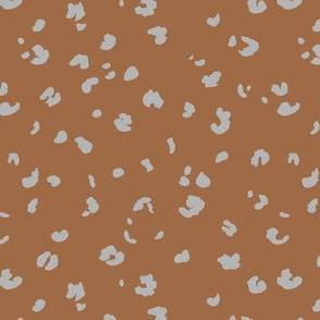 The messy animal print Dalmatian dots and leopard panther spots wild life boho trend nursery copper rust grey