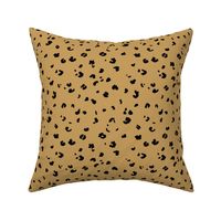 The messy animal print Dalmatian dots and leopard panther spots wild life boho trend nursery mustard ochre yellow black