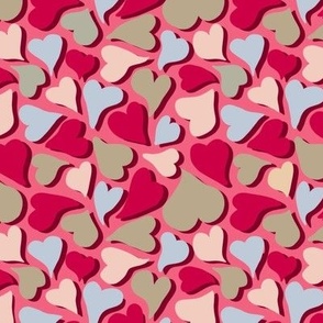 Pink, blue, green and beige hearts on Pink Magenta background 