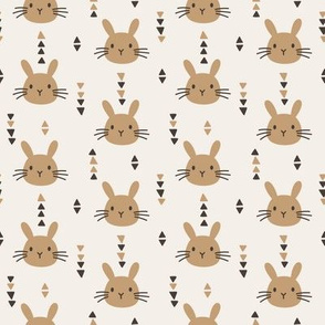Cute rabbits. Beige background. Small scale
