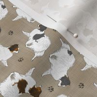 Tiny Trotting Phalene and paw prints - faux linen