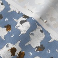 Tiny Trotting Papillons and paw prints - faux denim