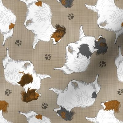 Trotting Papillons and paw prints - faux linen