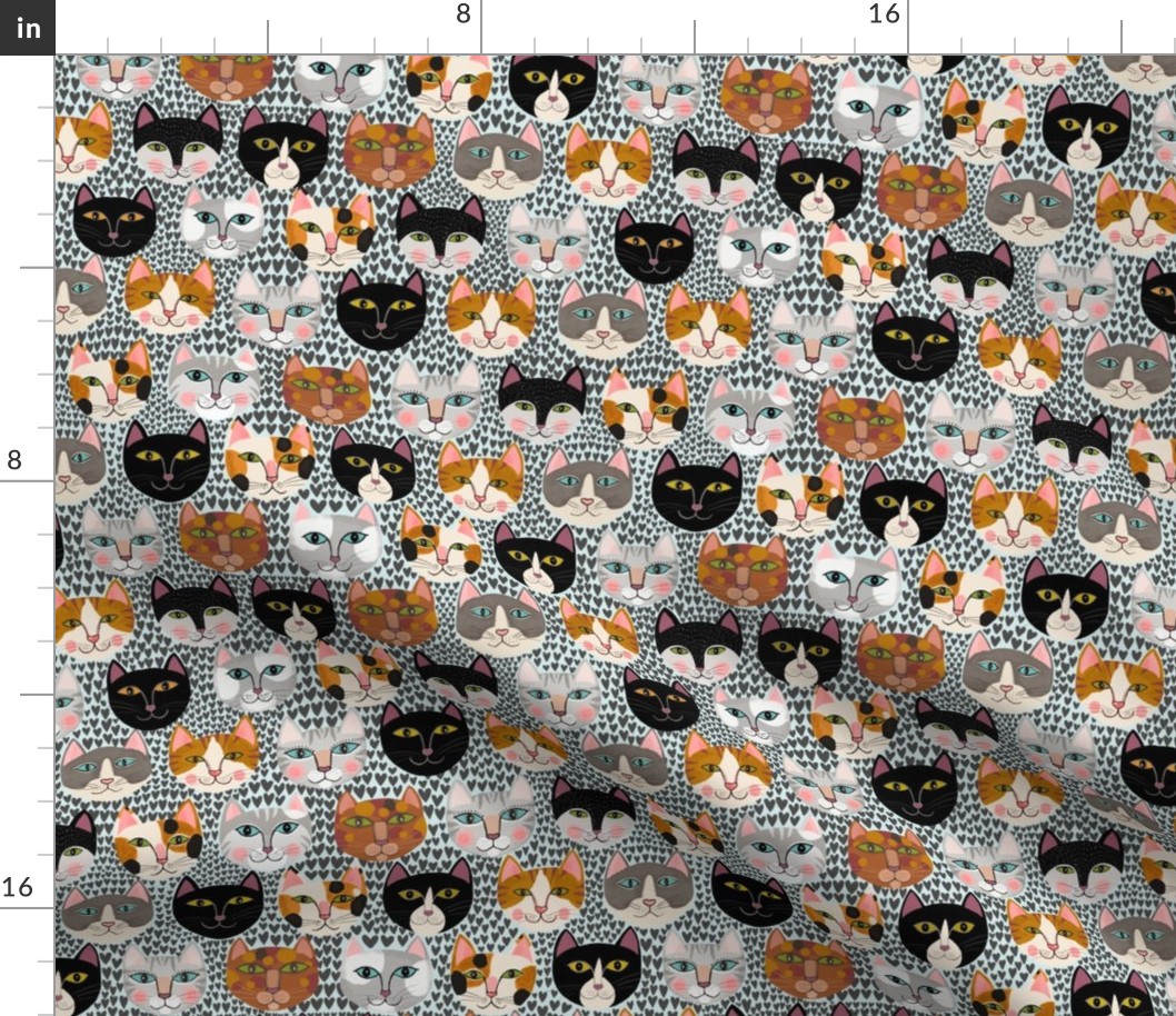 Cat Faces on Grey Hearts