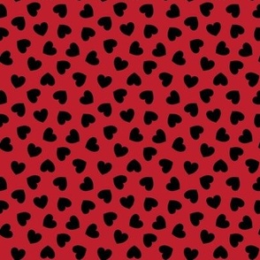 Tumbling hearts pattern - black on red