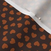 Tumbling Heart pattern - chocolate on dark oak