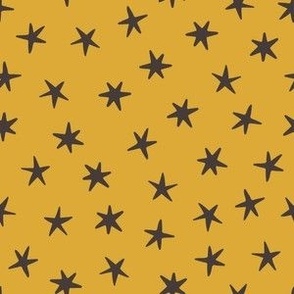 Dark stars on the yellow background