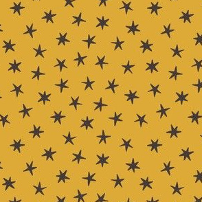 Dark stars on the yellow background. Small scale