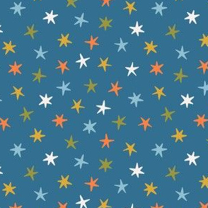 Colored stars on the blue background. Small scale