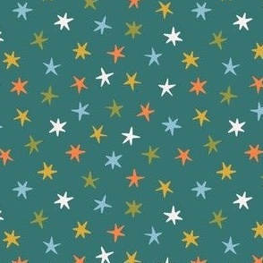 Colored stars on the emerald background. Small scale