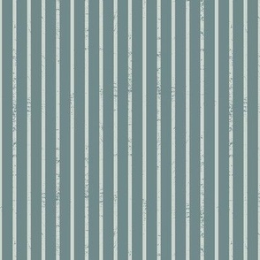 White scratched stripes on Aegean Teal