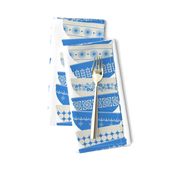 stacked bright blue garland pyrex bowls - white background-01