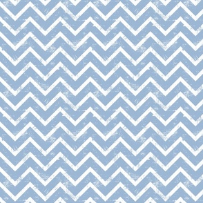 Cerulean blue scratched chevron on white