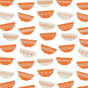 scattered orange pyrex bowls-small