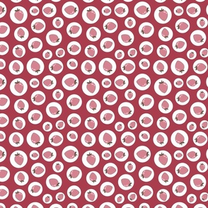 Pink strawberries in circles on red background