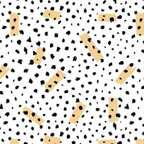 Wild Cheetah confetti dots and strokes boho nursery design black and white honey yellow