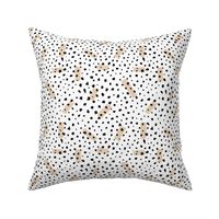 Wild Cheetah confetti dots and strokes boho nursery design black and white beige latte