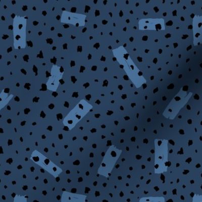 Wild Cheetah confetti dots and strokes boho nursery design black navy blue 