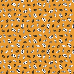 Cute pandas and leaves on bright orange background