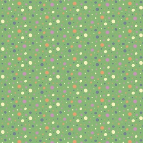 Lavender purple, orange, yellow, and blue dots on a green background